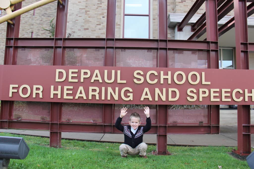 Billy at the DePaul sign