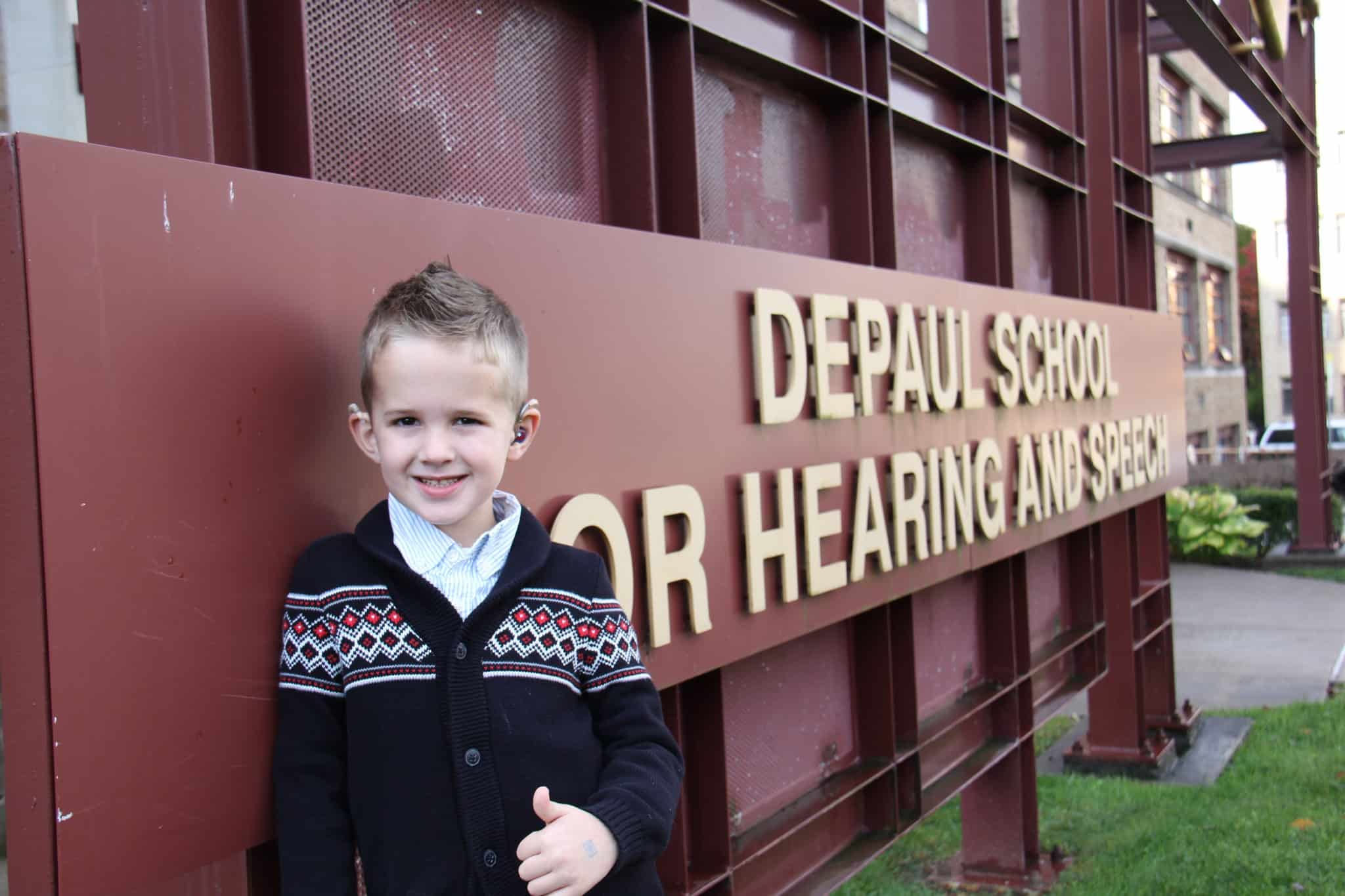 Billy at the DePaul sign