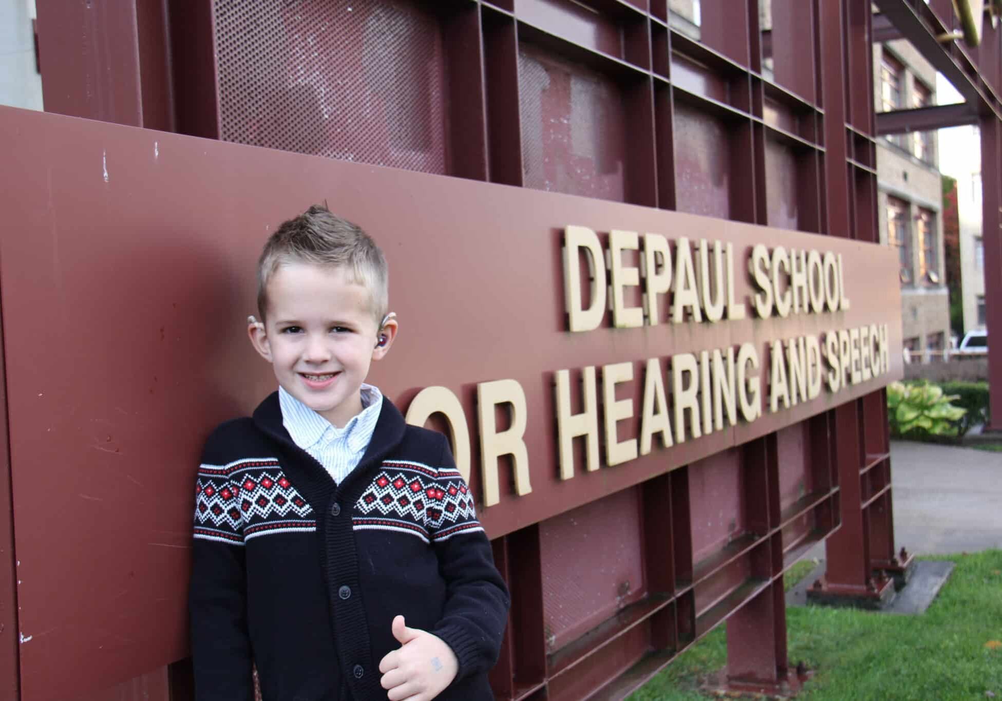 Billy at the DePaul sign